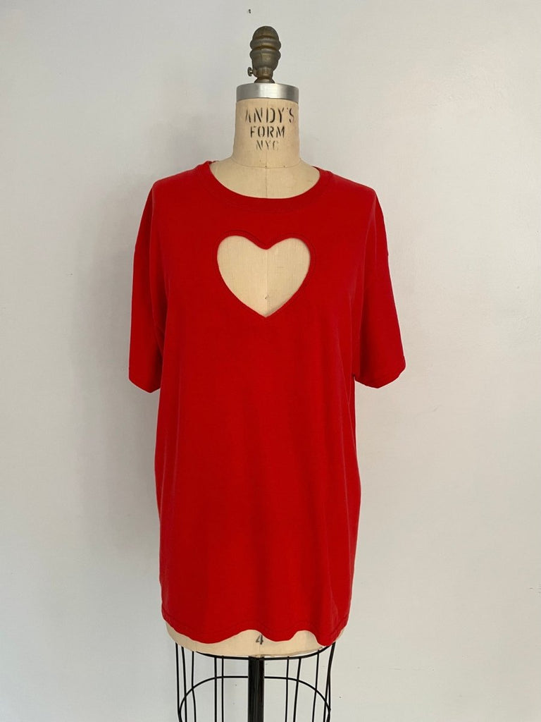 Front view of one-of-a-kind red t-shirt with heart cut-out and crochet rim, made from salvaged cotton