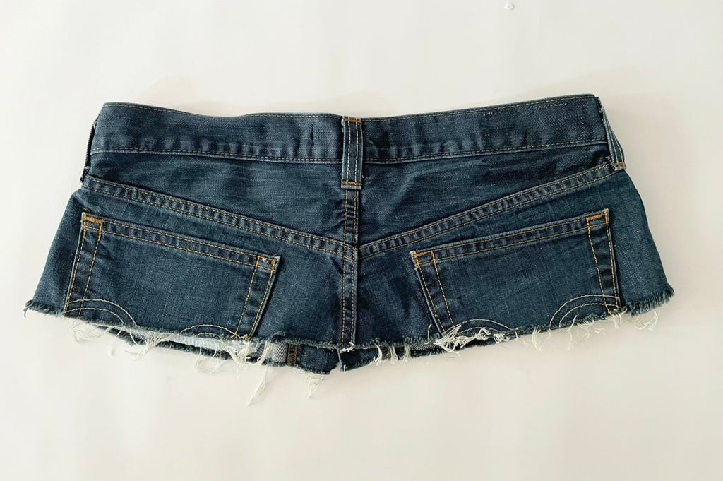 back view of one-of-a-kind repurposed denim belt with button closure, size 29 waist