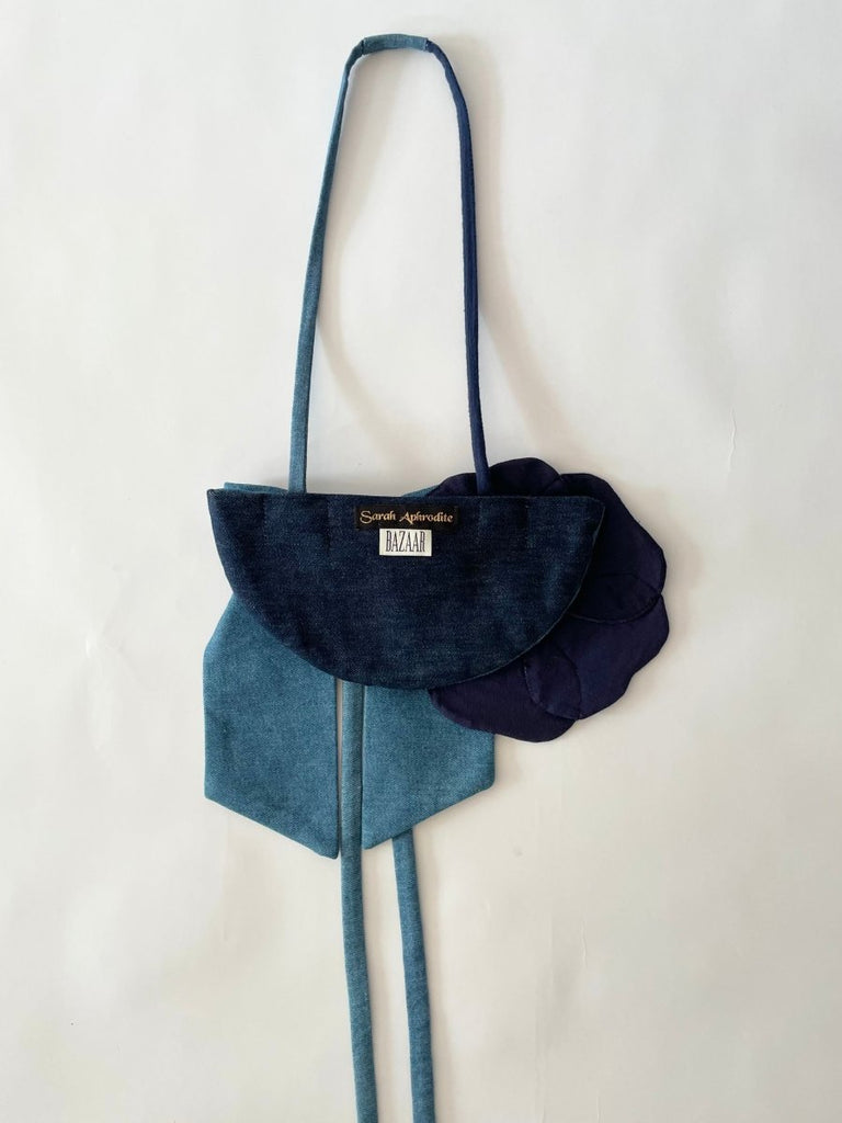 One of a kind handmade denim handbag with flower and bow made from recycled scraps