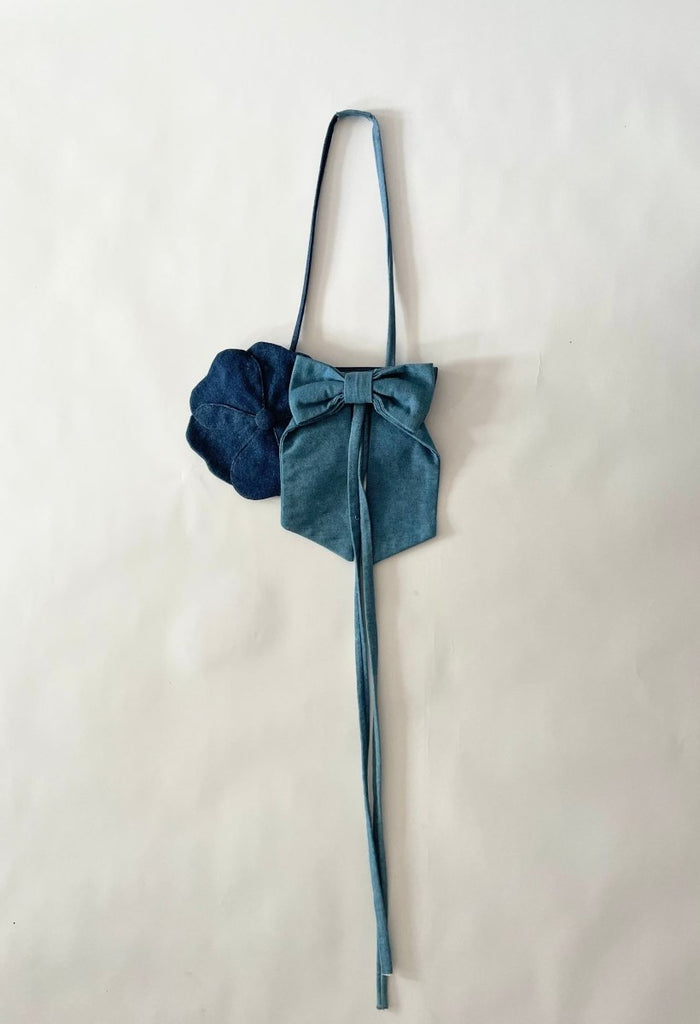 One of a kind handmade denim handbag with flower and bow made from recycled scraps