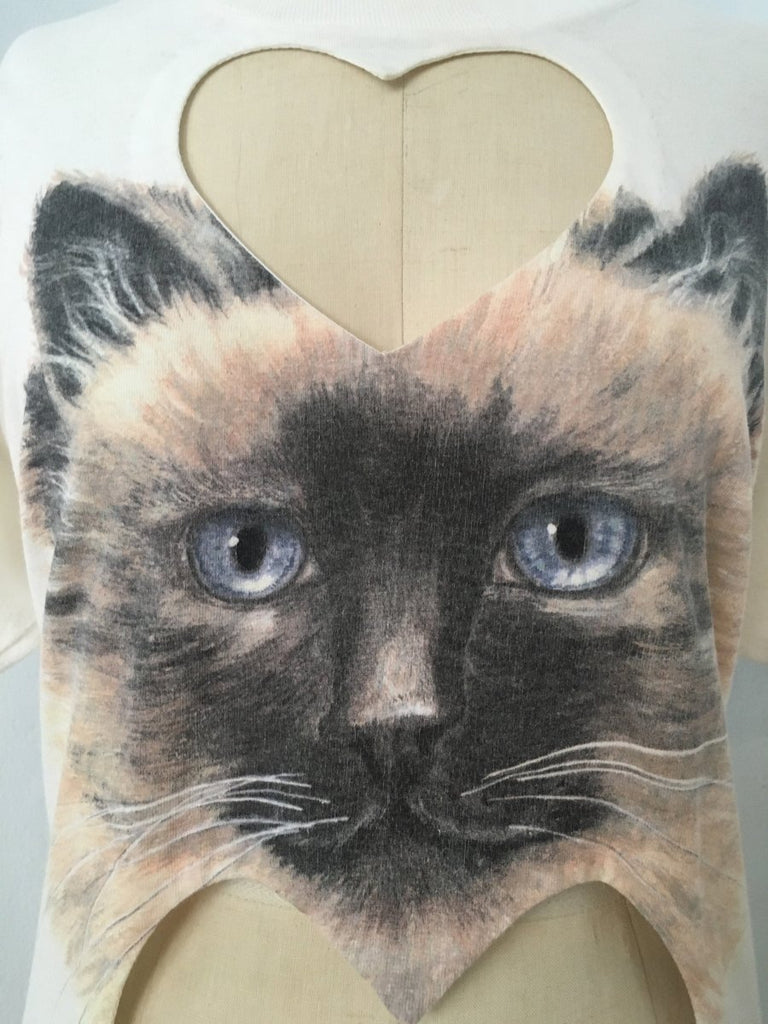Handmade double heart cut-out t-shirt with kitten print by Sarah Aphrodite, made from repurposed cotton. Soft, one-of-a-kind, features unique markings and fits XS–M.