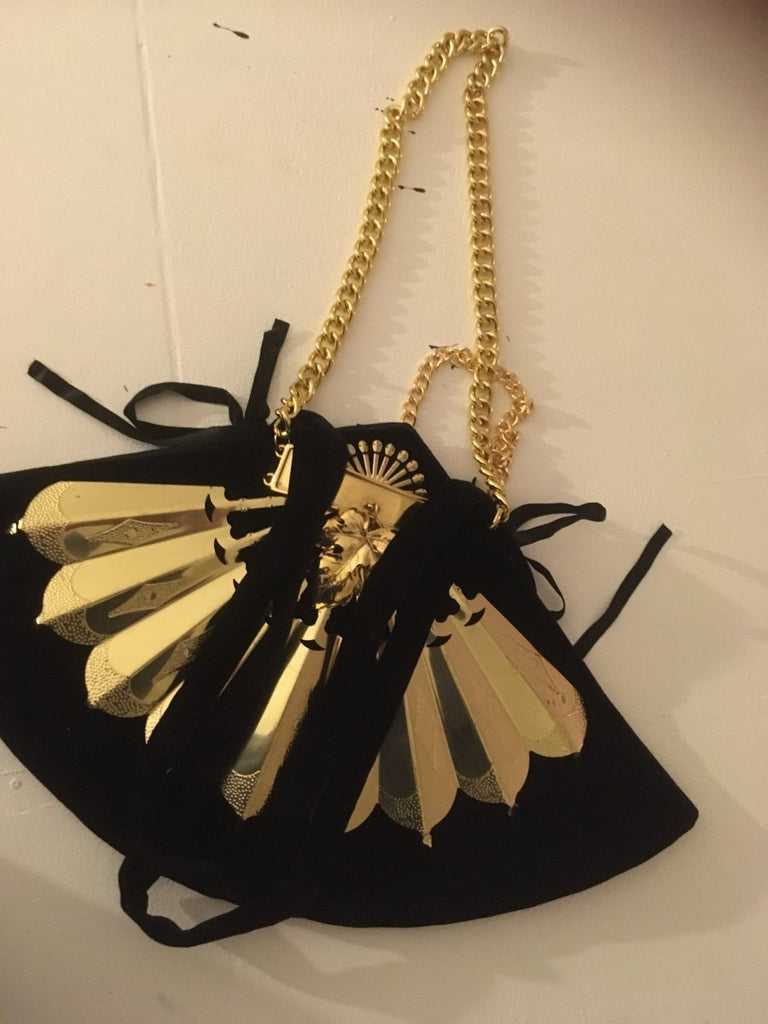 One-of-a-kind handmade “FAN” bag by Sarah Aphrodite. Cotton velvet exterior, silk-cotton lining, gold fan details, velvet-chain handles. Measures 19"x11".
