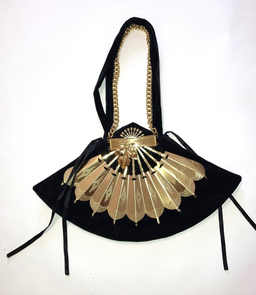 One-of-a-kind handmade “FAN” bag by Sarah Aphrodite. Cotton velvet exterior, silk-cotton lining, gold fan details, velvet-chain handles. Measures 19"x11".