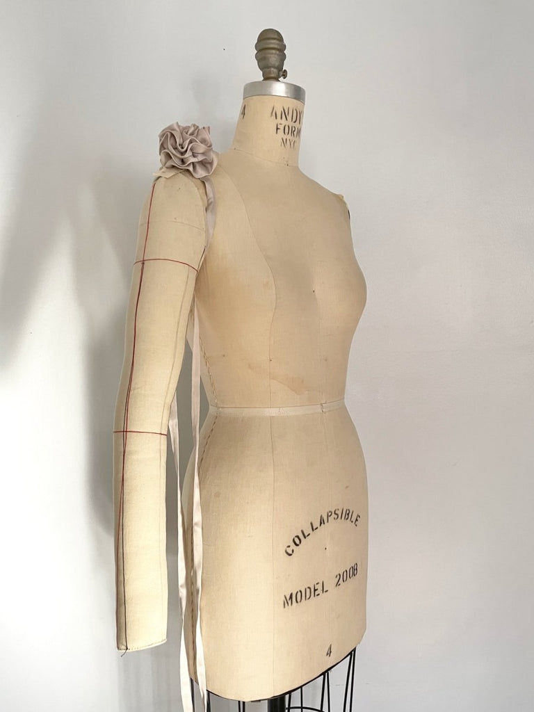 One-of-a-kind silky periwinkle flower accessory by Sarah Aphrodite, hand-sewn from upcycled fabric scraps. Versatile design with ties, worn as bracelet, anklet, neck, or arm accessory.