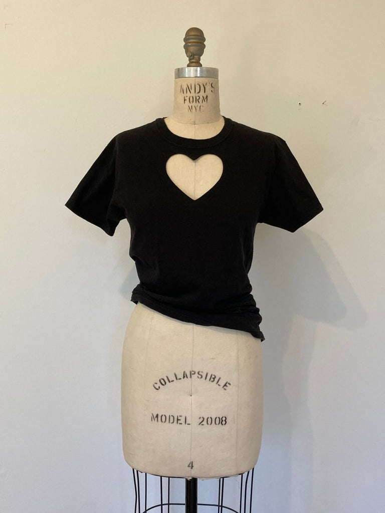 Black handmade upcycled heart cut out T-shirt by Sarah Aphrodite on a mannequib