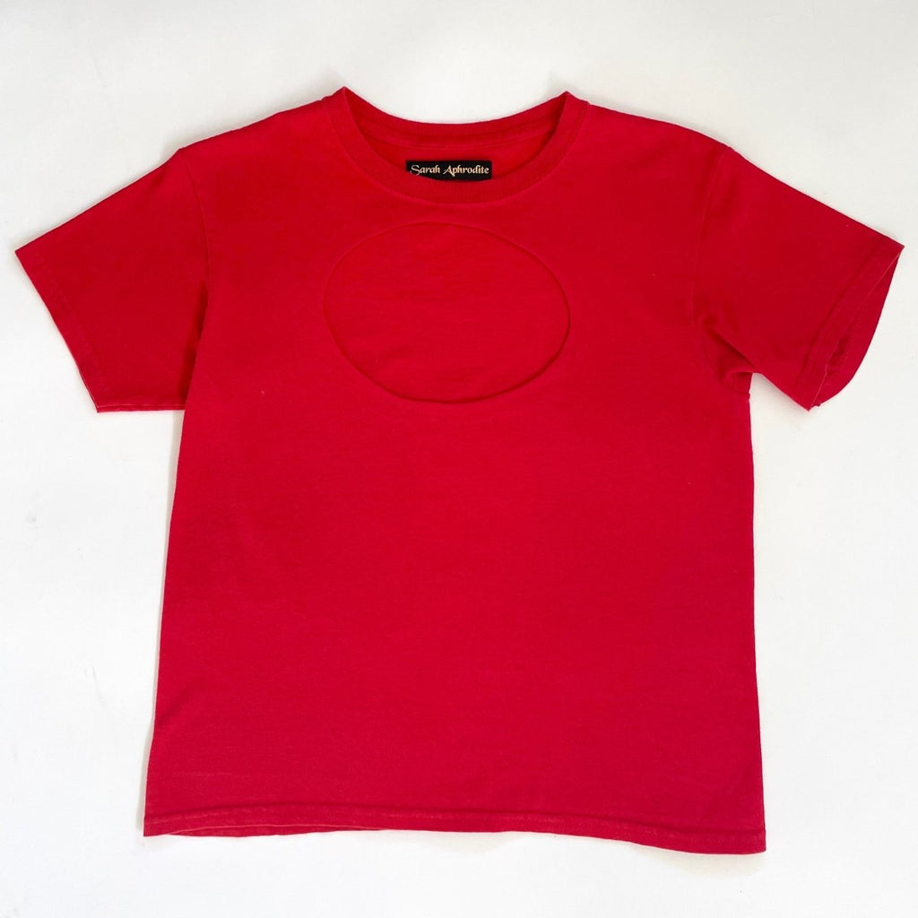 One-of-a-kind red vintage t-shirt with hand-sewn oval cut-out by Sarah Aphrodite. Handmade, sustainable, fits XS/S, and designed for bold creative styling.