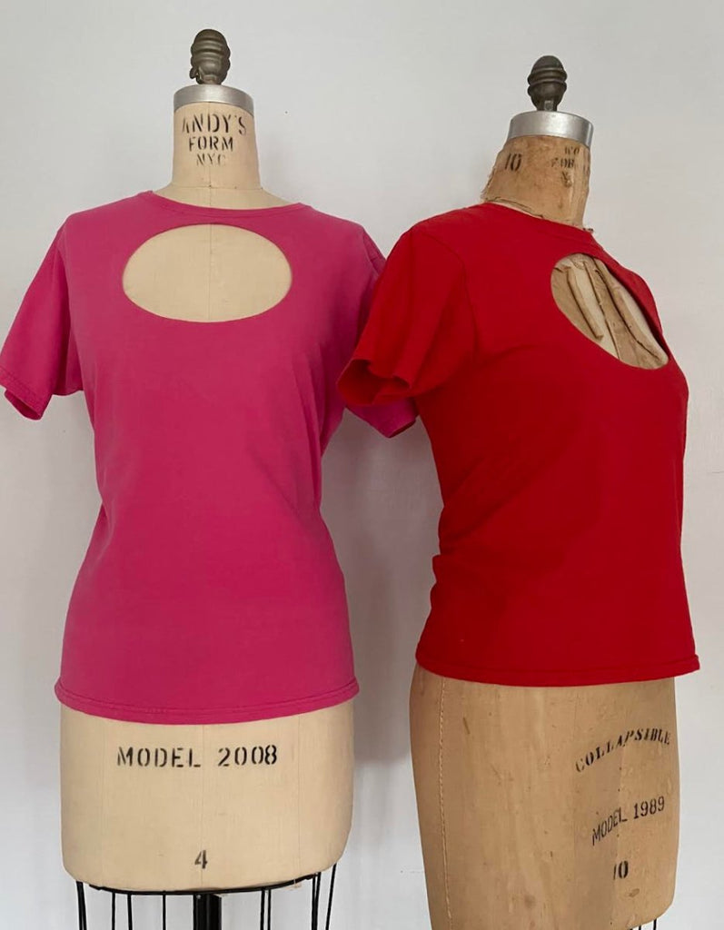 One-of-a-kind red vintage t-shirt with hand-sewn oval cut-out by Sarah Aphrodite. Handmade, sustainable, fits XS/S, and designed for bold creative styling.