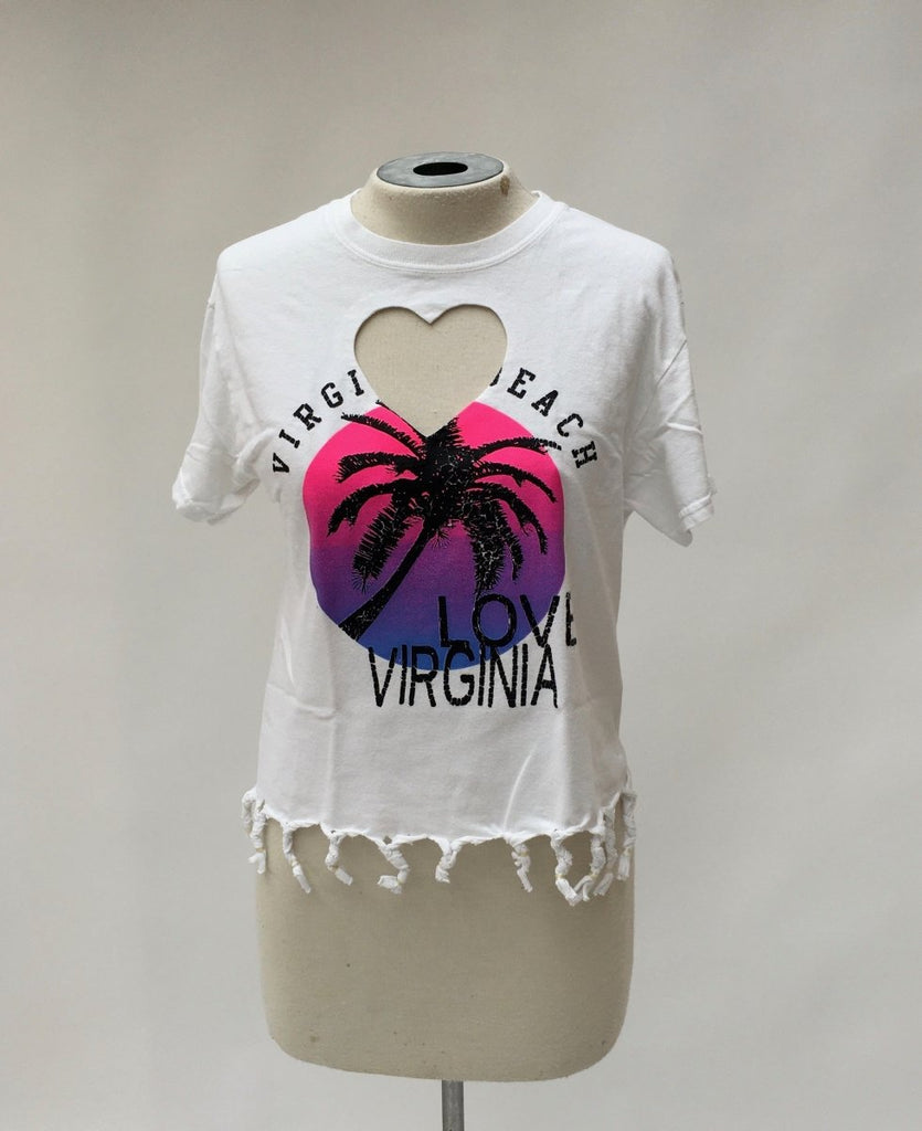 One-of-a-kind handmade ‘VIRGINIA BEACH’ cropped tee by Sarah Aphrodite, featuring a heart cut-out, fringe detailing, and crafted from vintage cotton. XS–S fit, unique markings from upcycled fabric.
